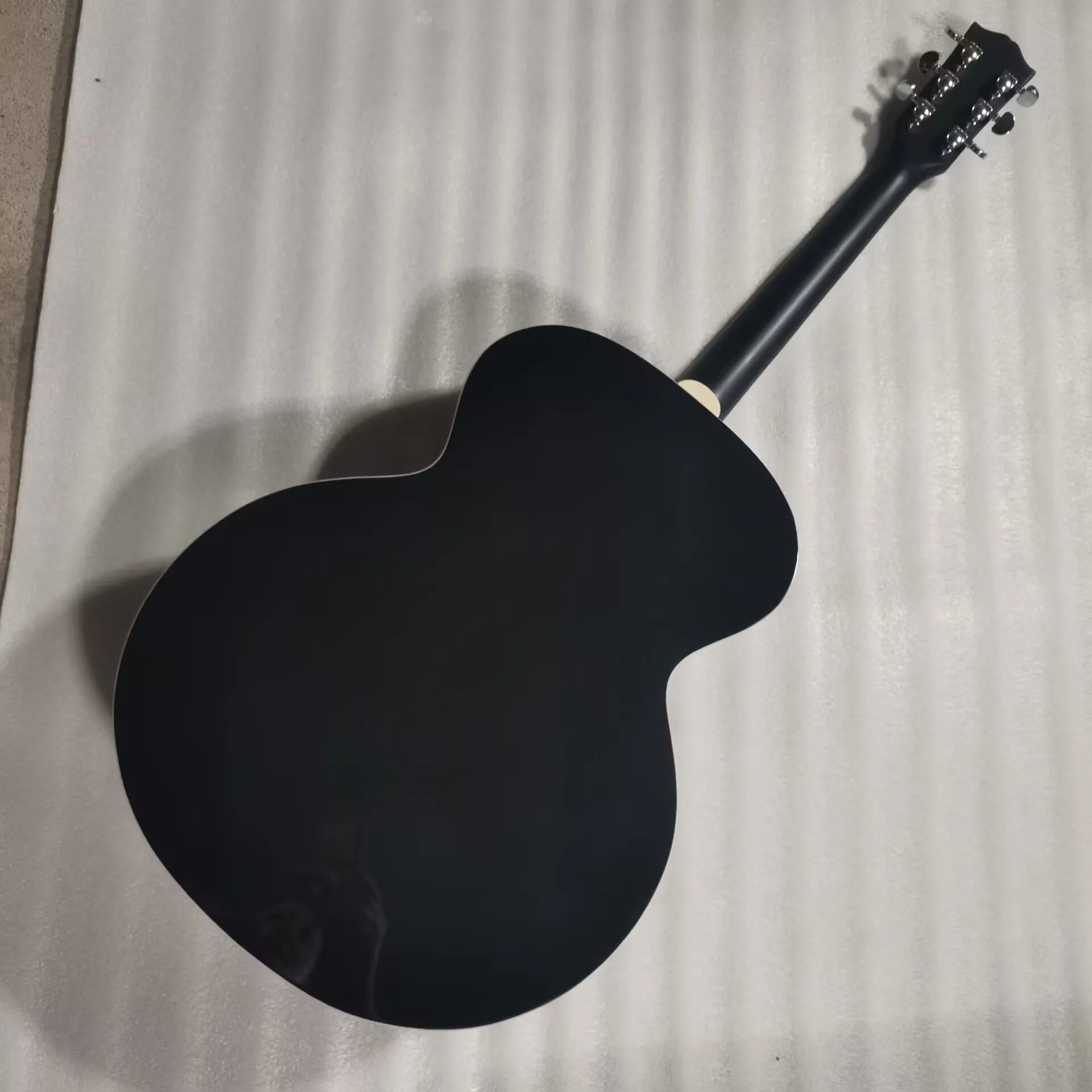 Black acoustic guitar, star inlay elvis brother style guitar
