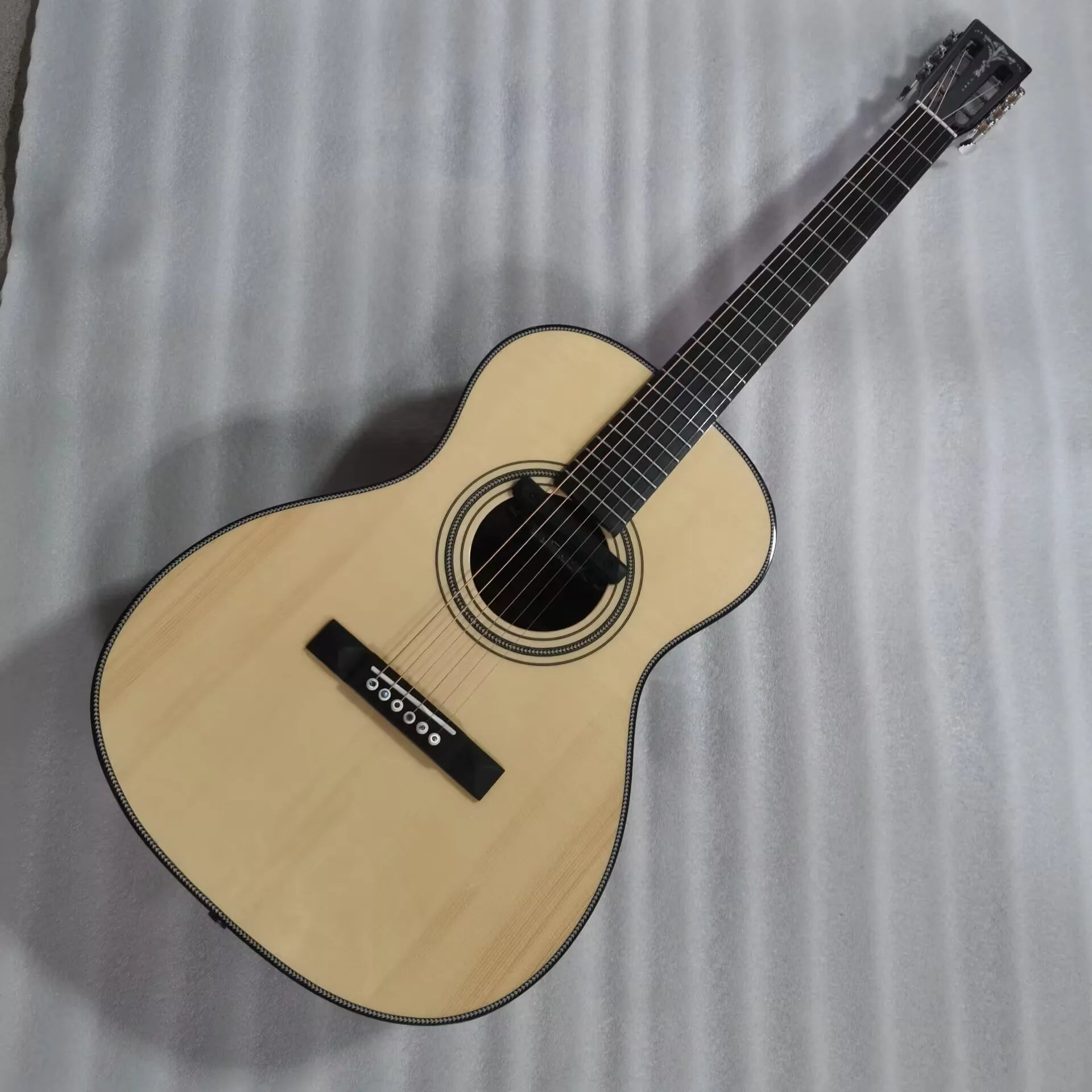 custom acoustic guitar with Adirondack spruce, 13 fret joint