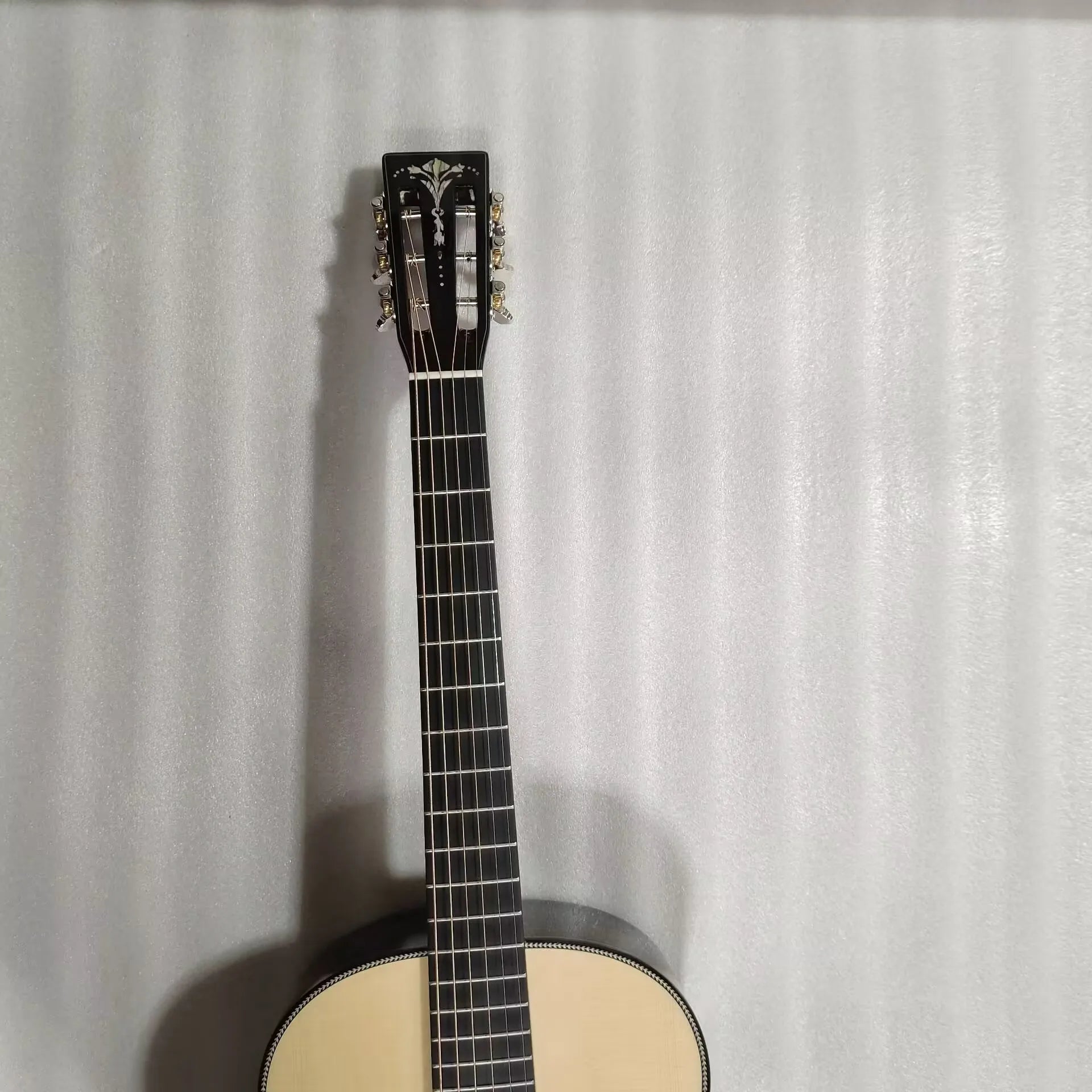 custom acoustic guitar with Adirondack spruce, 13 fret joint