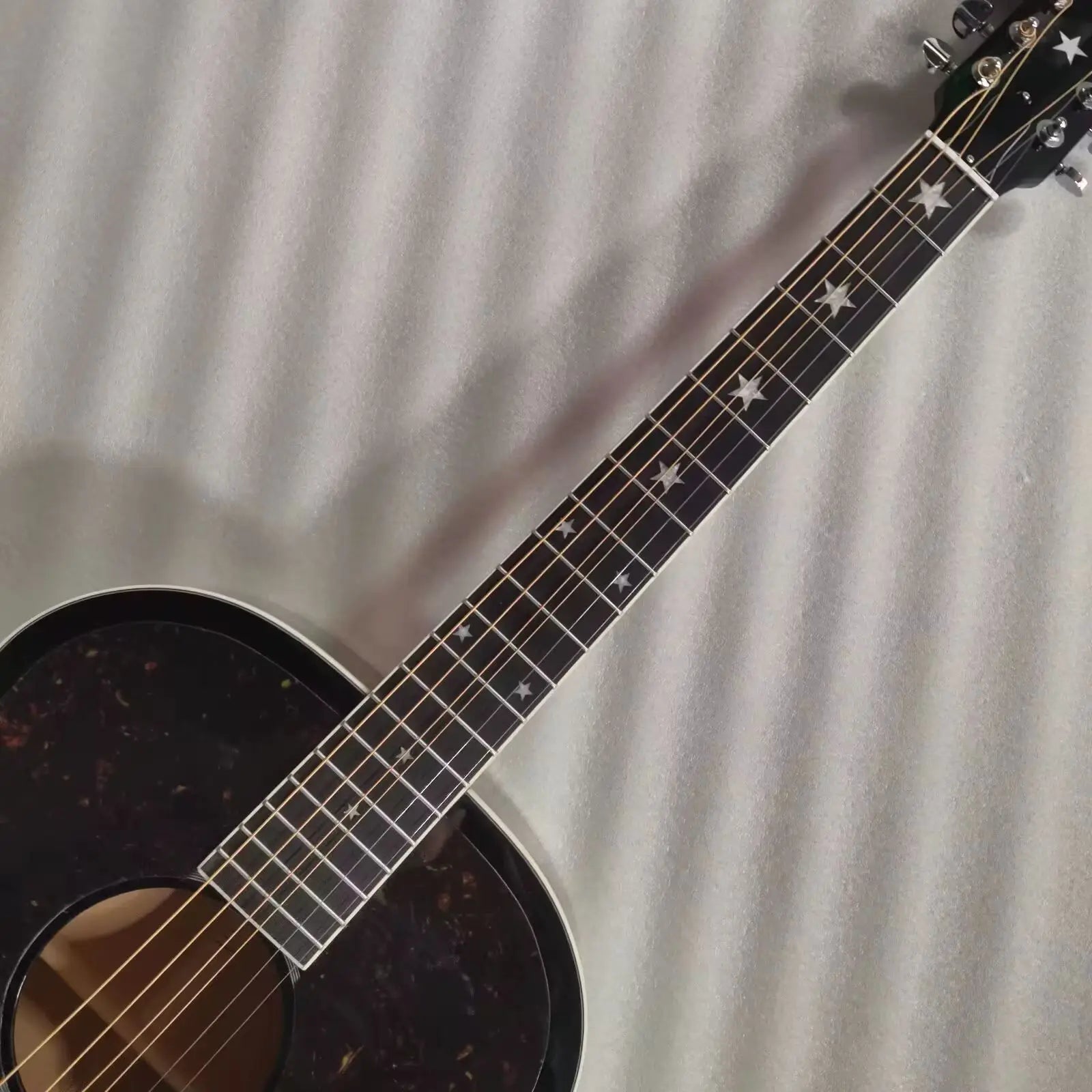 Black acoustic guitar, star inlay elvis brother style guitar